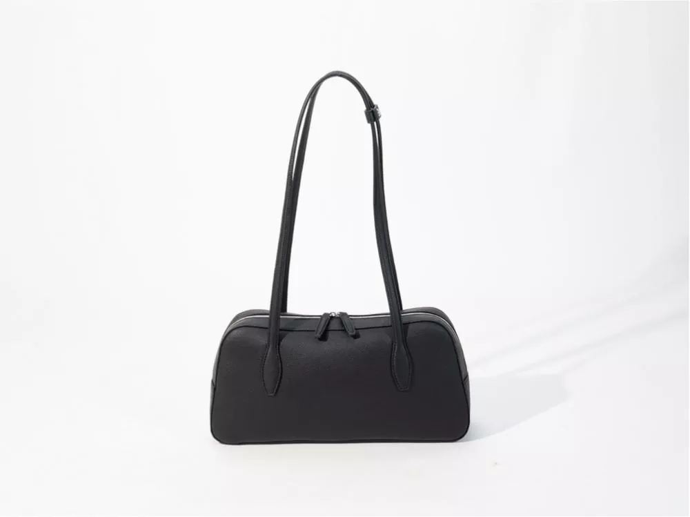 Quam eligere Commuter Underarm Bag? Comparison Guide: PVC vs. PU Materials